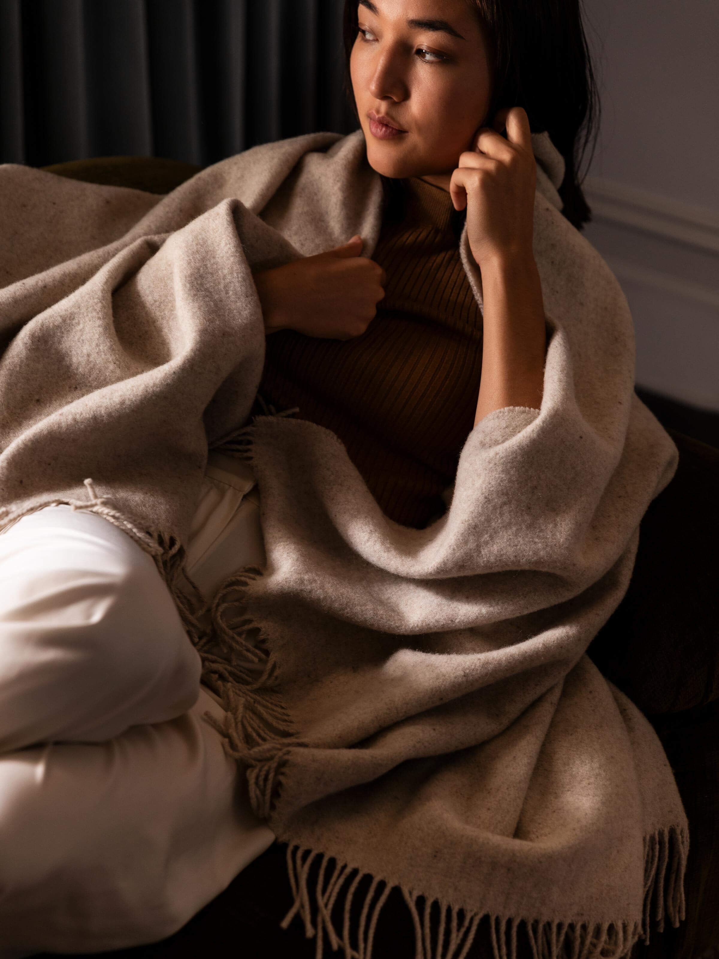 A close up image of our 100% Australian Wool 400gsm Chocolate Alby Blanket and Cushion
